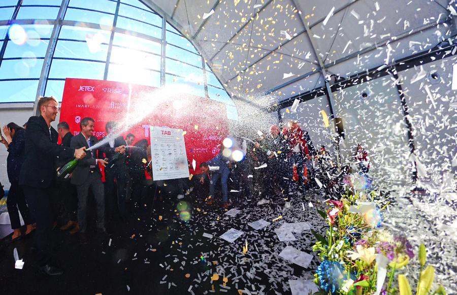 Champagne celebration at the TAB* launch