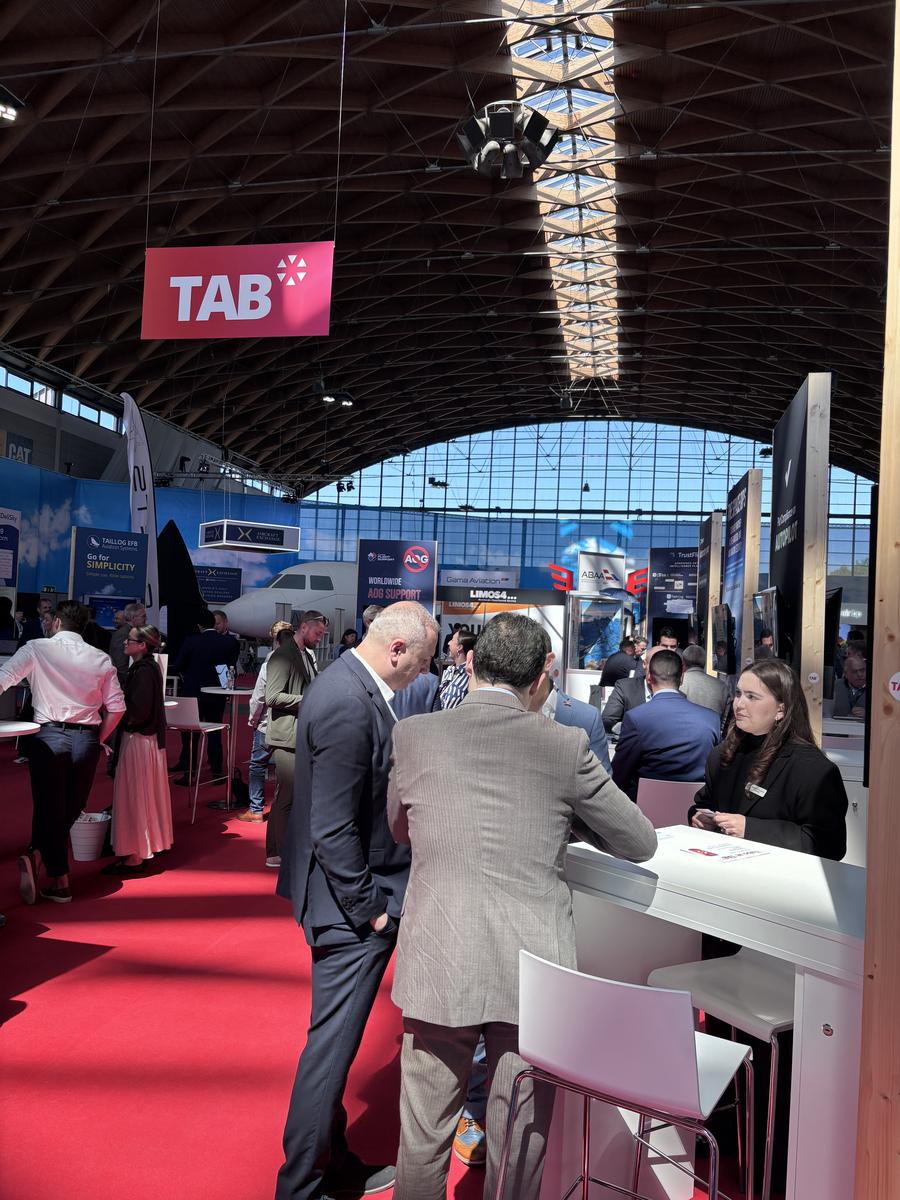 Visitors in conversation at the TAB* pavilion